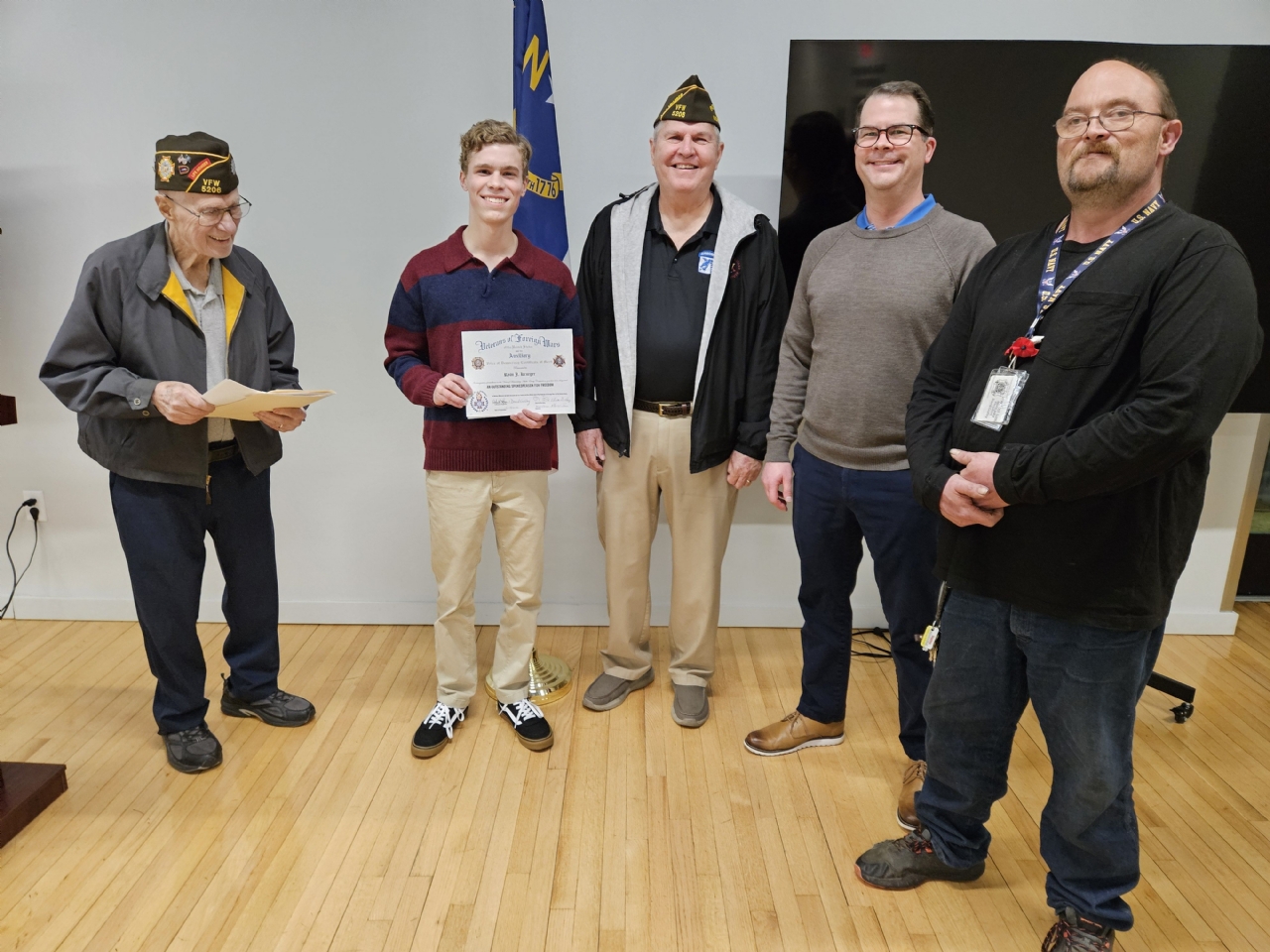 VoD winner Ryan Krueger flanked by Post/Auxillary members and family